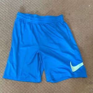 Nike Blue Athletic Shorts with Yellow Swoosh